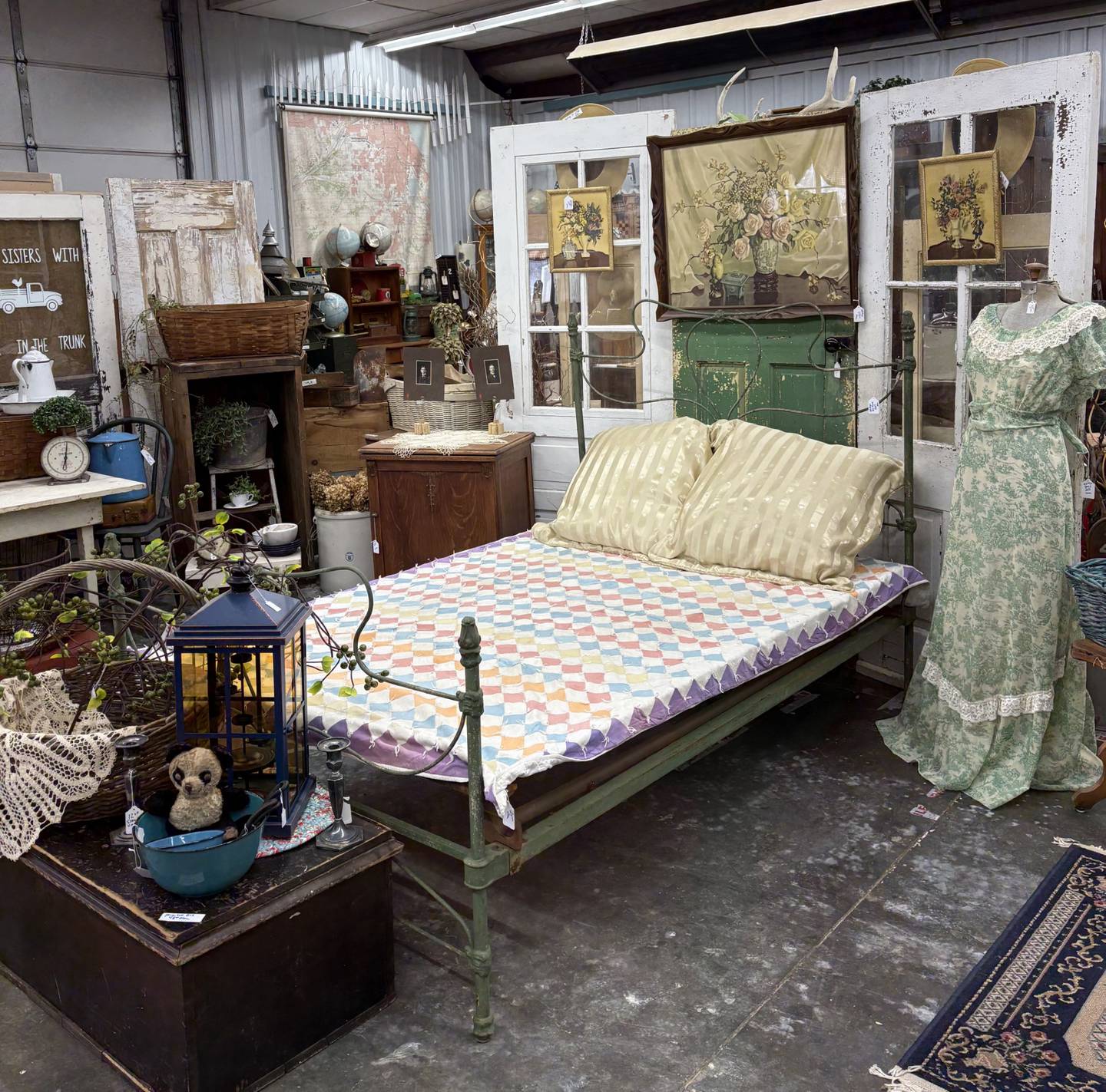 "Two Sisters with Junk in the Trunk" vintage items for sale in Marengo. The market is among hundreds in this weekend's 2026 Spring Vintage Shop Hop.