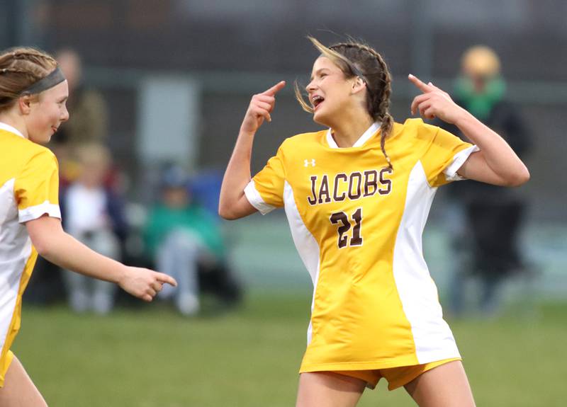 Jacobs’ Kylie Deegan, right, celebrates her goal with teammate Clare Leib against Hampshire in varsity girls soccer on Thursday, April 17, 2025, at Jacobs High School in Algonquin.