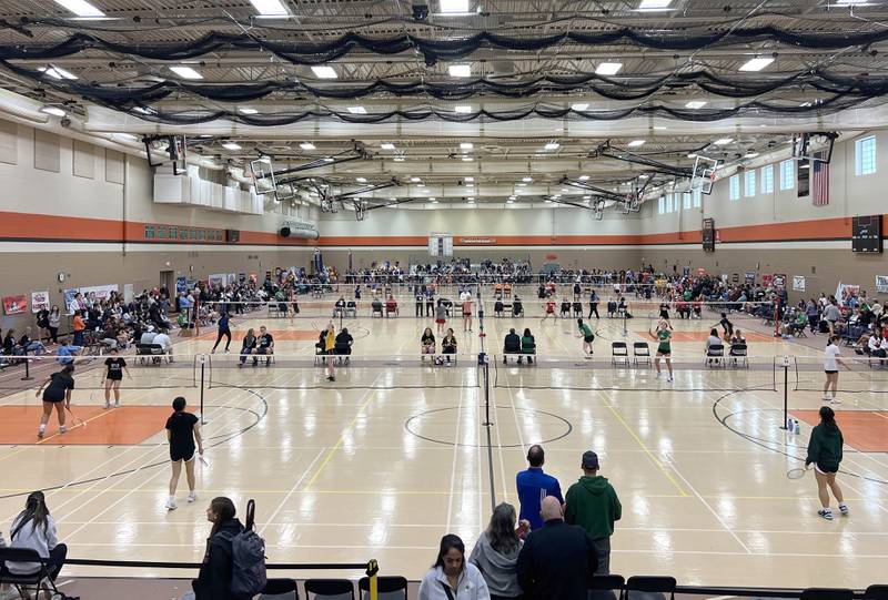 Play begins in the field house Friday, May 10, 2024, during the IHSA State Badminton Finals at DeKalb High School.