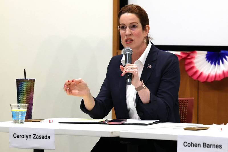 Democratic candidate Carolyn Zasada, who is vying for the nomination for the 76th district seat in the Illinois House of Representatives, answers a question Saturday, Feb. 3, 2024, in a meet the candidates forum at the DeKalb Public Library. Democratic candidates Amy Murri Briel and Cohen Barnes also spoke at the event organized by DeKalb Stands and co-sponsored by the DeKalb County Democrats.