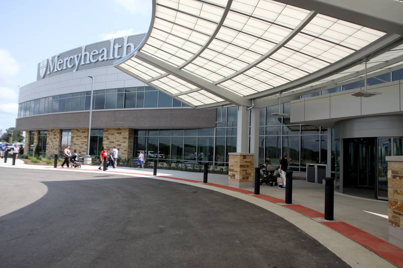 People arrive during a public open house for the new Mercyhealth hospital in Crystal Lake on Saturday.