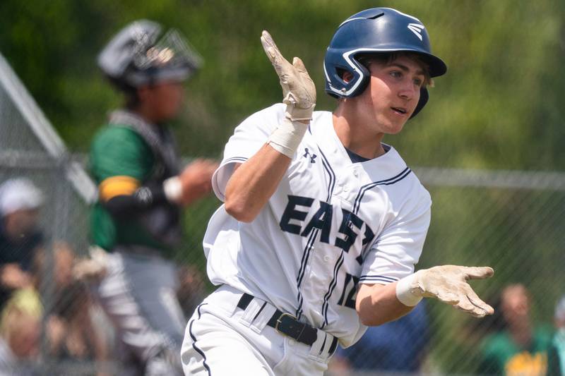 Oswego East's Andrew Lewis (10) reacts after driving in a run on a single against Waubonsie Valley during the Class 4A Waubonsie Valley Regional final between Waubonsie Valley and Oswego Easy at Waubonsie Valley High School in Aurora on Saturday, May 27, 2023.