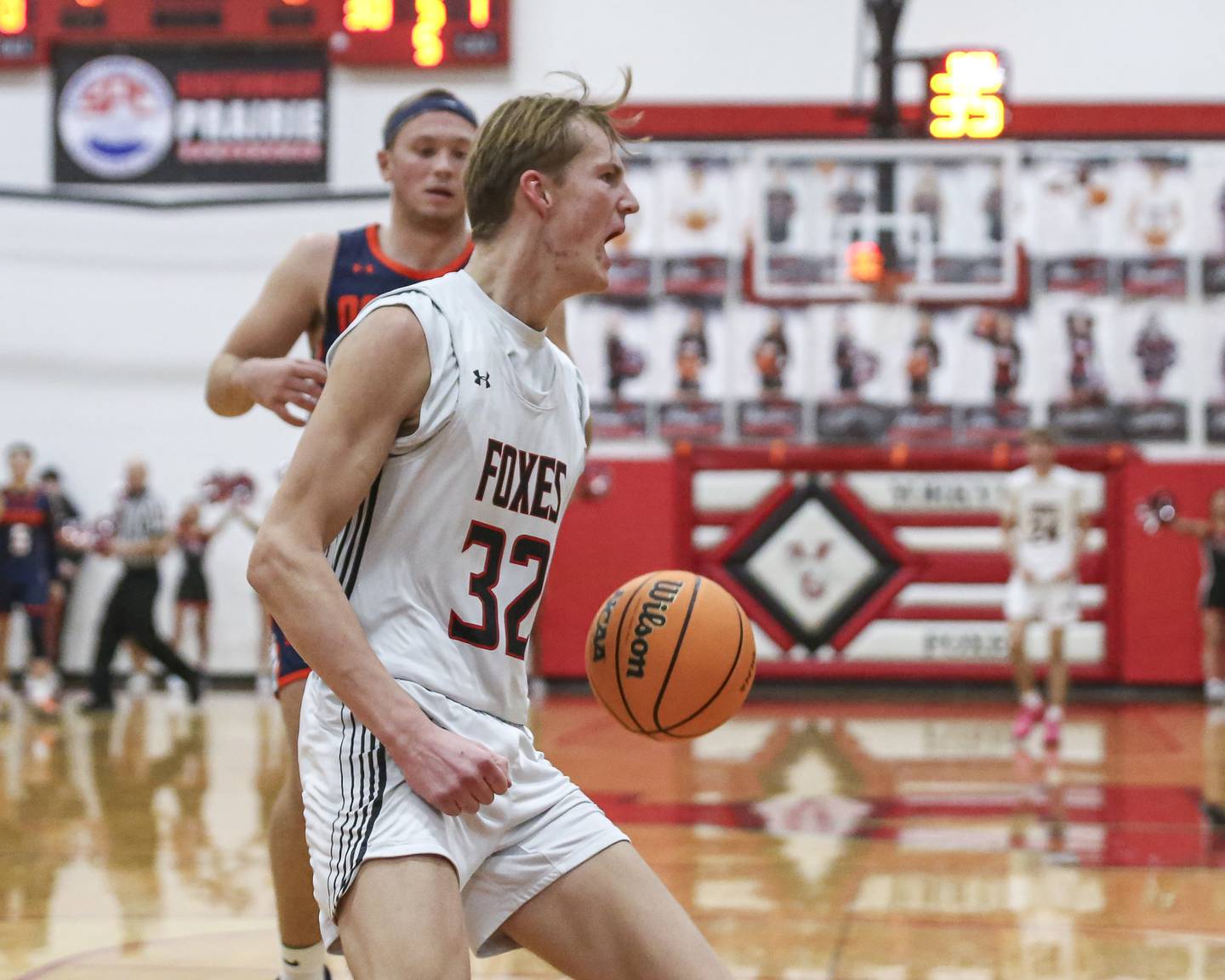 Yorkville's Joey Jakstys (32) yells out after dunking during their basketball game between Oswego at Yorkville Friday, Dec 12, 2025 in Yorkville.