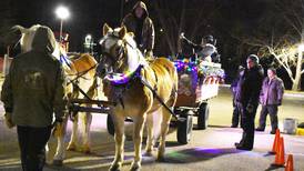 Wagon rides carry visitors through Rock Falls’ Centennial Park