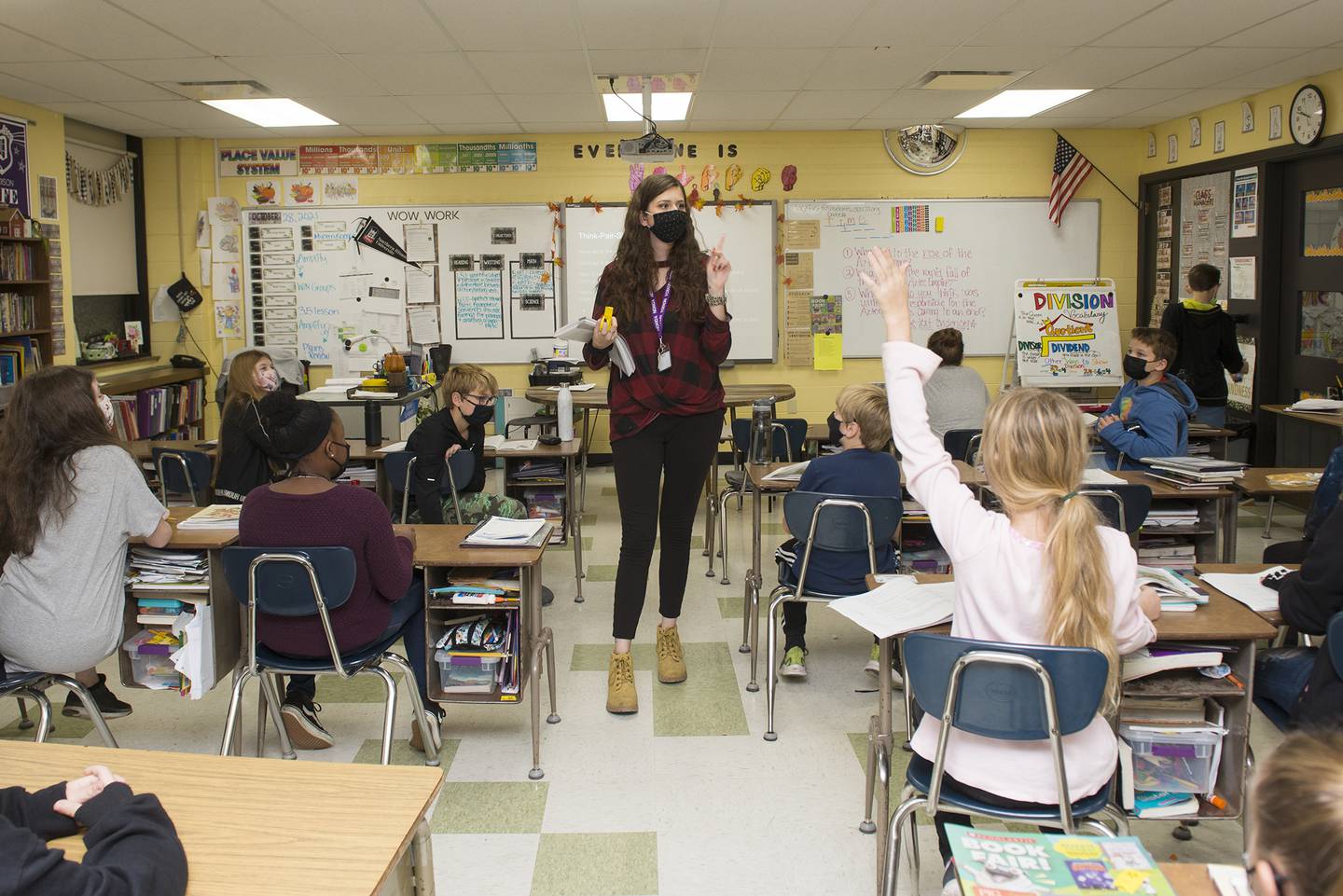 Madison fifth-grade teacher Shannon Sherlock works with her students in a file photo from Thursday, Oct. 28, 2021. She was one of the teachers who tested the Amplify English Language Arts curriculum during a pilot program in the first semester.