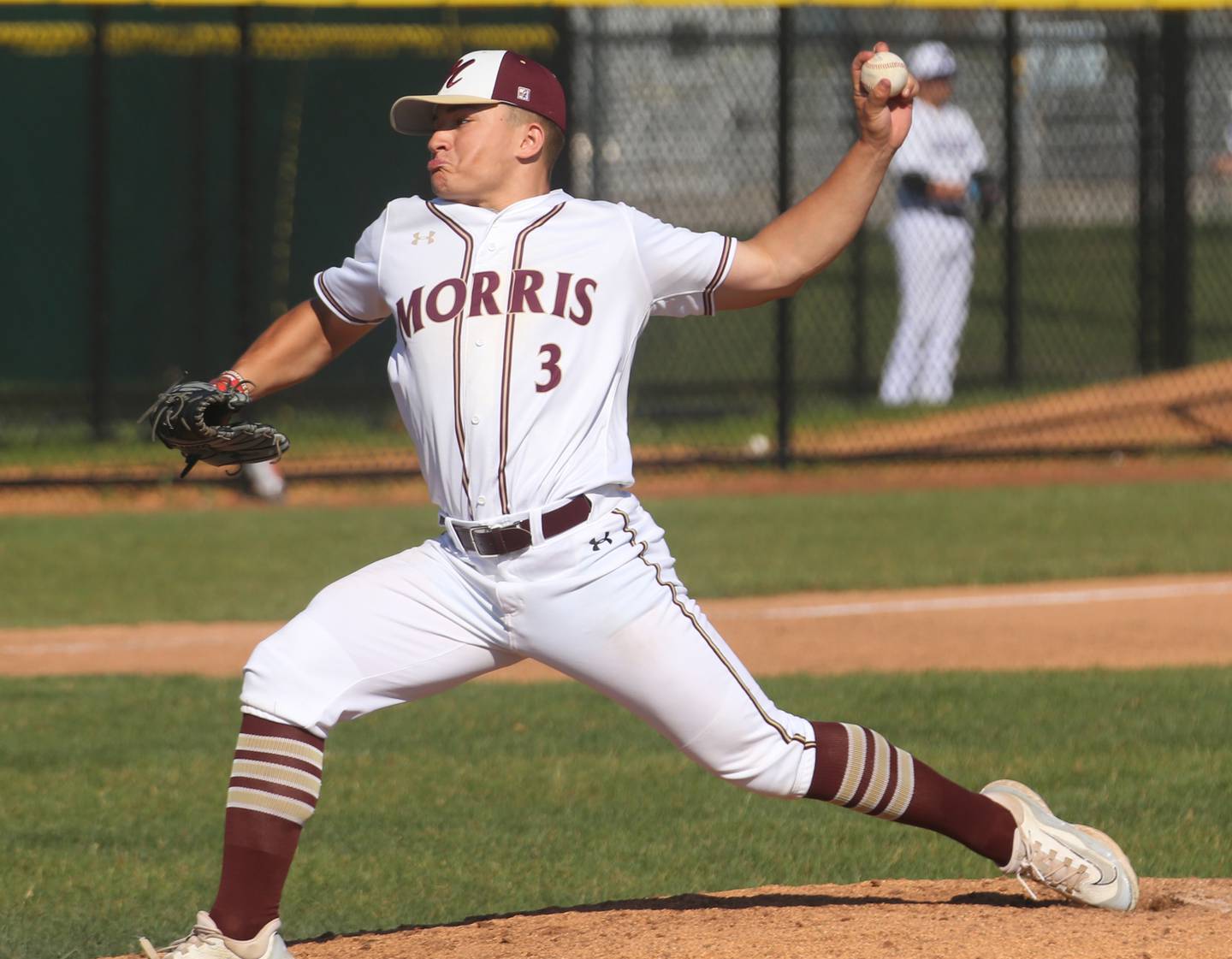 Morris pitcher Cody DelFavero lets go of a pitch to L-P during the Class 3A Regional semifinal game at Huby Sarver Field in La Salle.