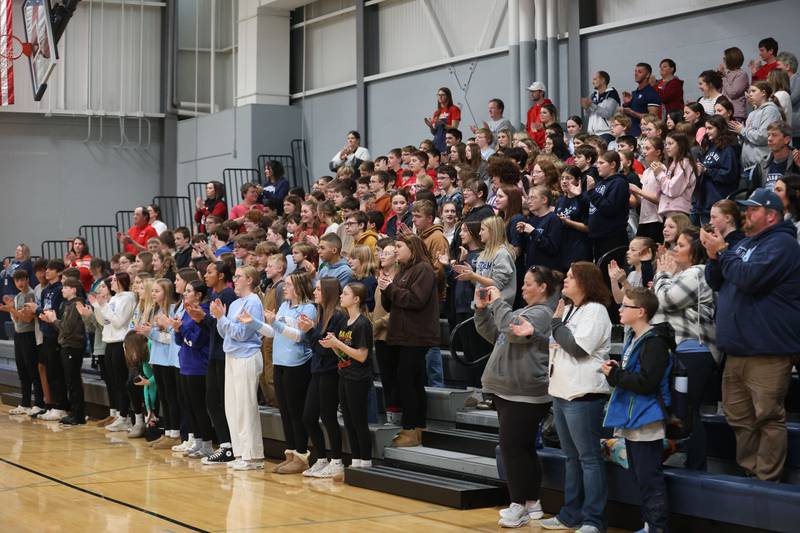 Bureau Valley Junior High Schools students and parents appluad the Bureau Valley Storm seventh-grade girls basketball team during a prep rally on Thursday, Dec. 11, 2025 at Bureau Valley High School in Manlius. The Storm (23-1) will meet undefeated Mt. Sterling Brown County (25-0) for the IESA Class 2A state title at 7:30 p.m tonight.