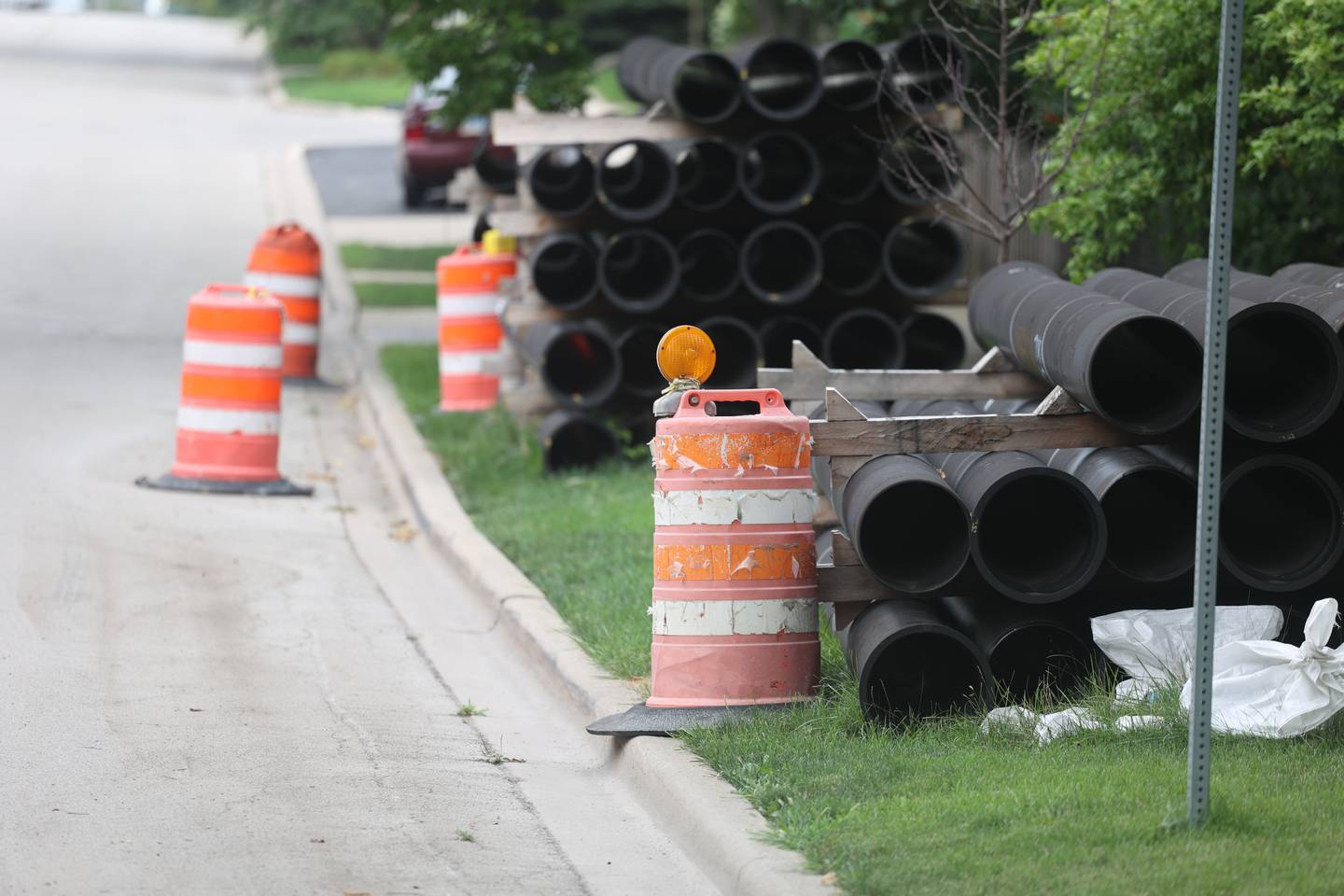 Pipes sit along West Douglas Street in Joliet. Thursday, August 4, 2022 in Joliet.