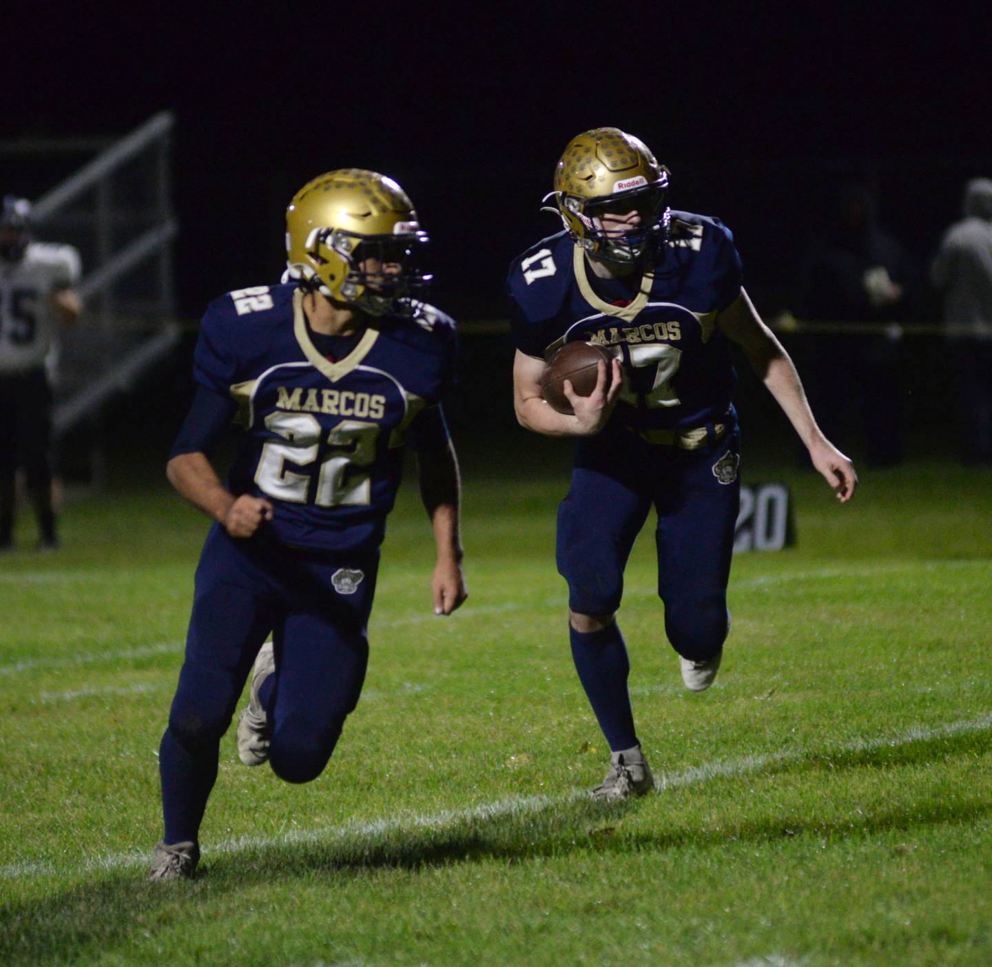 Polo's Delo Fernandez (22) blocks for Brock Soltow (17) against West Prairie during 8-man football playoff action on Friday, Oct.27, 2023 at Polo High School.