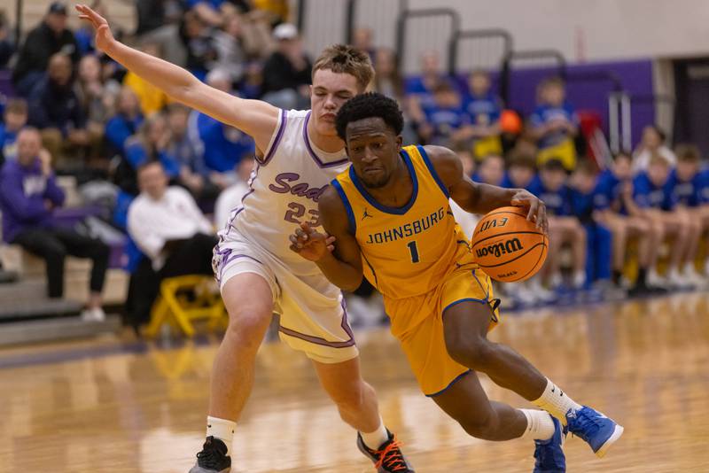 Jarrel Albea drives the ball down the court against the defense of Brady Lindsay of Rockford Lutheran during the IHSA 2A Sectional Championship game on March 6, 2026 at Mendota High School.