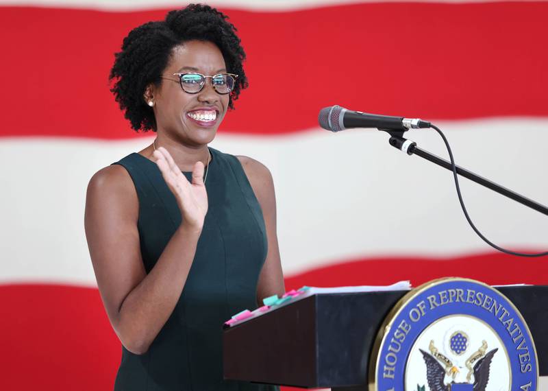 U.S. Rep. Lauren Underwood, D-Naperville, greets attendees as she comes to the podium Tuesday, Aug. 23, 2022, during a town hall meeting at the DeKalb Taylor Municipal Airport.
