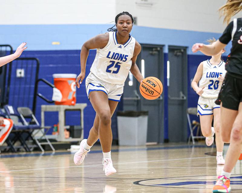 Lyon's Nora Ezike (25) races down the court during their Coach Kipp's Hoopfest basketball game between Lyons at St Charles East. Jan 18, 2025 in La Grange.