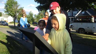 Yorkville children and parents get first read on storywalk