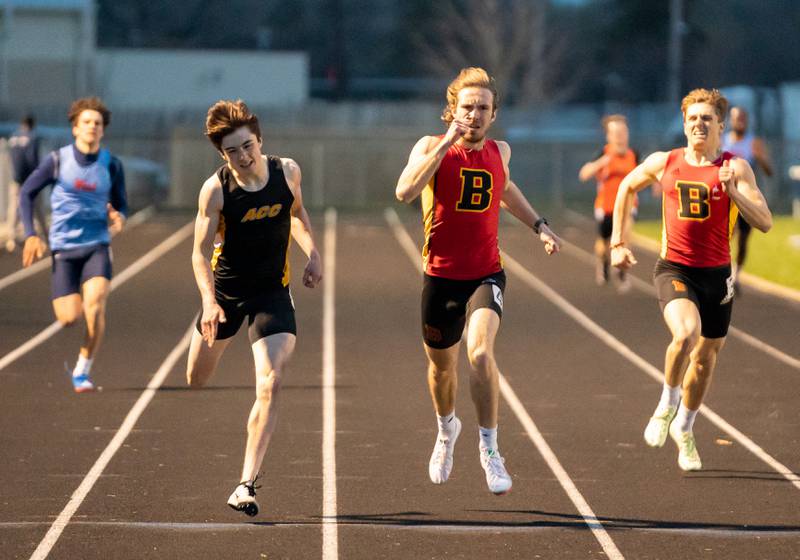 Aurora Central Catholic’s Patrick Hilby beats Batavia’s Jason Fallon to win the 400 meter dash during the Roger Wilcox Track and Field Invitational at Oswego High School on Friday, April 29, 2022.