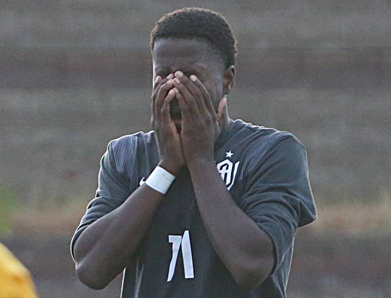 Wheaton Academy's Josiah Pitts reacts after hitting the upper crossbar of the goal post against Timothy Christian during the Class 1A State soccer third place game on Saturday, Oct. 29, 2022 at EastSide Centre in Peoria.