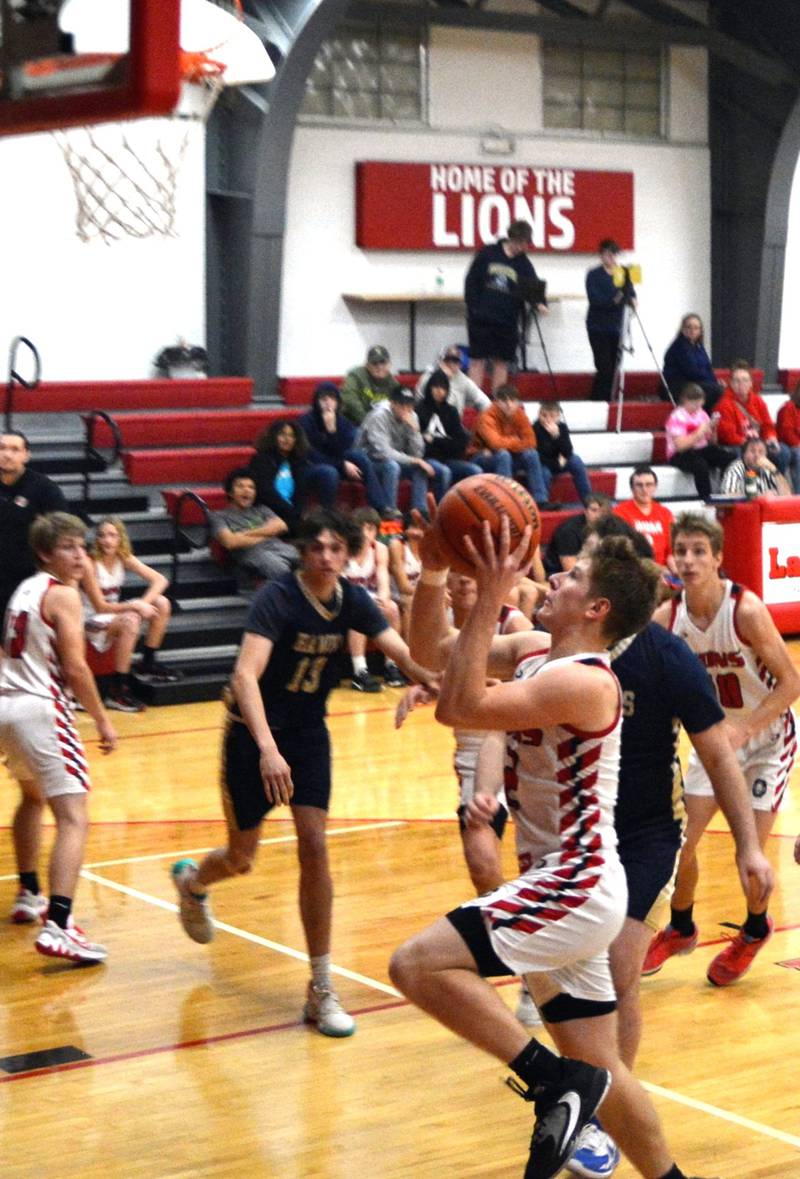 LaMoille's Brayden Klein against Hiawatha Wednesday night at Dean Madsen Gymnasium. The Lions won 62-54.