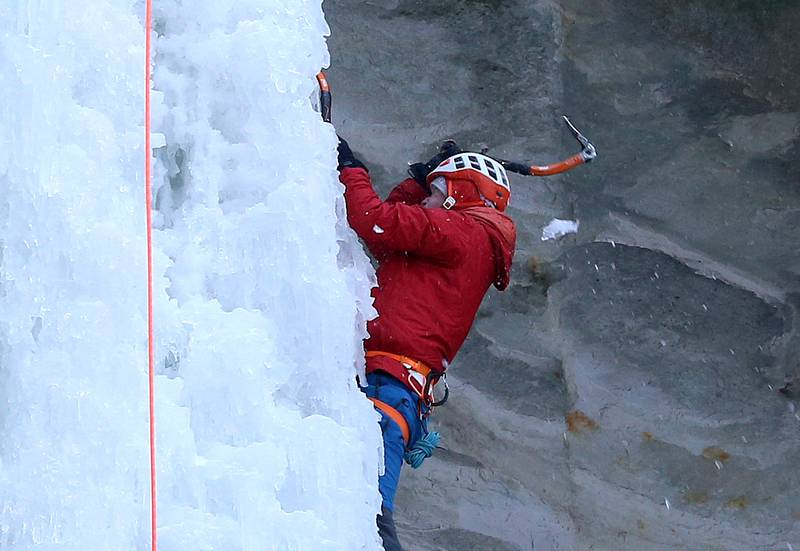 Gerry Voelliger of Bettendorf Iowa, climbs a 35-foot frozen waterfall in Ottawa Canyon at Starved Rock State Park on Friday, Jan. 19, 2024 in Starved Rock State Park. The waterfalls tend to freeze for a brief time during January at the State Parks.  Climbers need to sign in & out at the front of the Park Maintenance Building across from the Visitor Center. Climbing is only allowed in 4 canyons at the park.