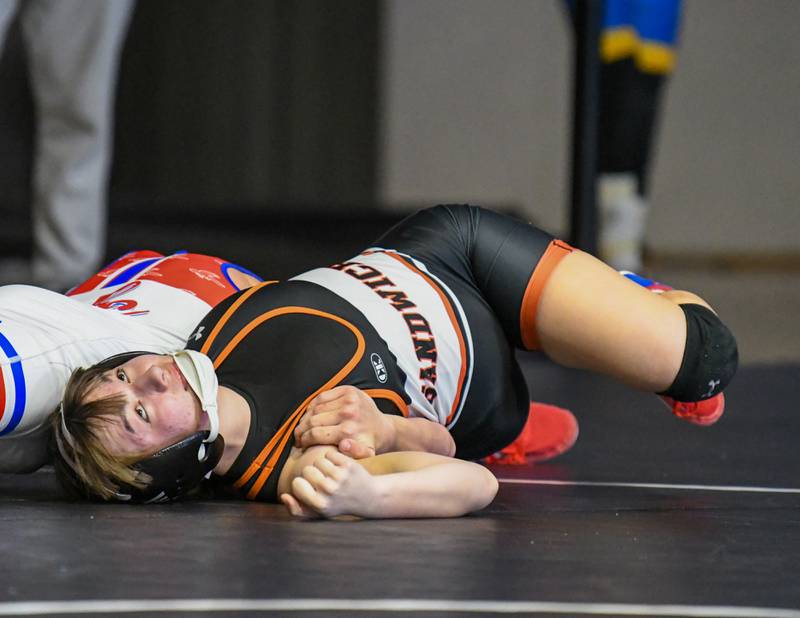 Sandwich wrestler Ashly Strenz competes in the third place 113 weight class Saturday Dec. 10 at the Plano Reaper wrestling classic held at Plano high school.