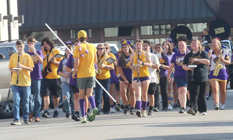 Members of the Mendota High School Band march down Indiana Avenue during the homecoming parade on Friday, Oct. 3, 2025