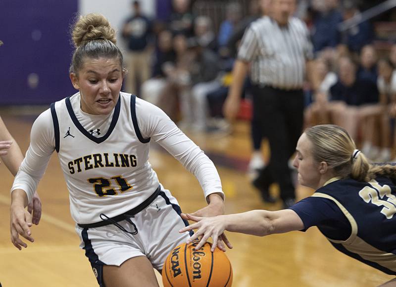 Sterling’s Jaelynn James has the ball swiped away by Rockford Christian’s Ava Reese Friday, Dec. 26, 2025, at the Duchesses Basketball Christmas Classic.