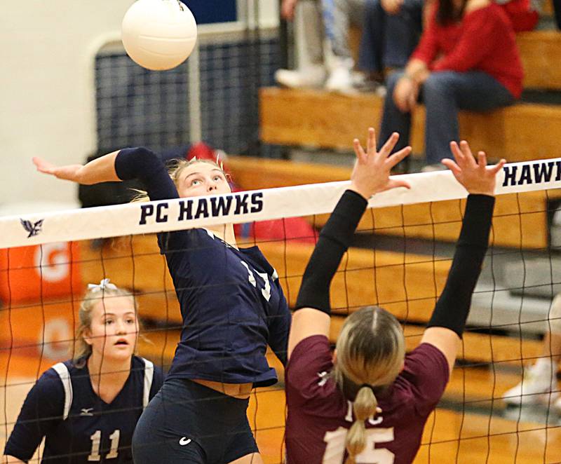 Fieldcrest's Kaylin Rients sends a kill past IVC's Sage Geltmaker in the Class 2A Sectional volleyball final at Prairie Central High School on Wednesday, Nov. 2, 2022 in Fairbury.