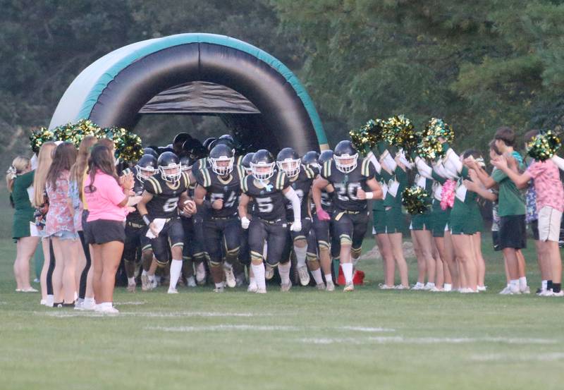 Members of the St. Bede football team take the field before playing Seneca on Friday, Sept. 20, 2024 at St. Bede Academy.