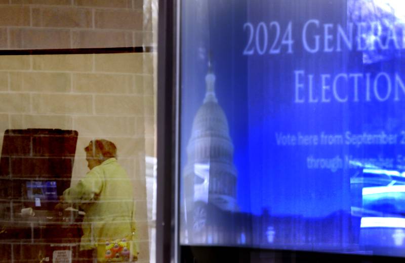 A voter votes at the McHenry County Election Center on Thursday Oct, 31, 2024, in Woodstock.