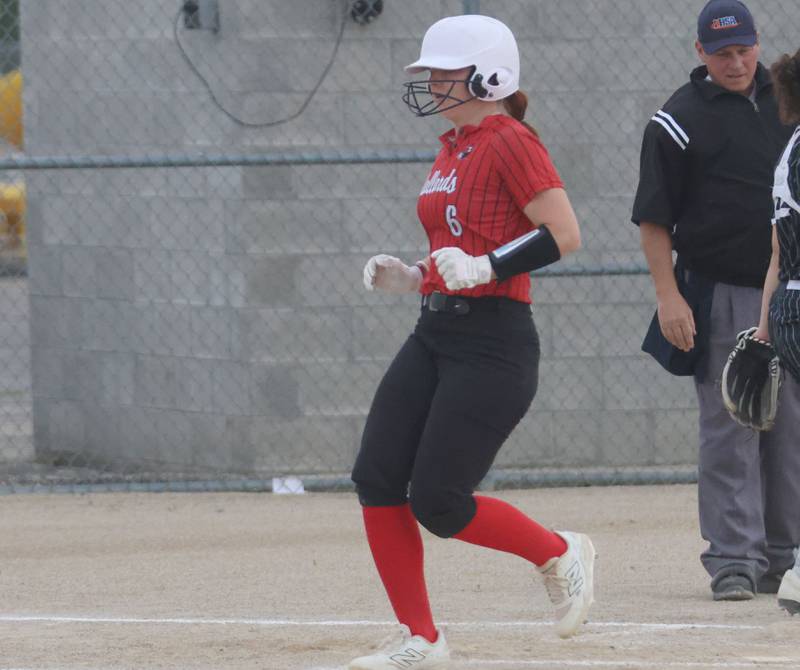 Henry-Senachwine's Brynna Anderson scores a run against Woodland on Tuesday, May 12, 2026 at Woodland High School.