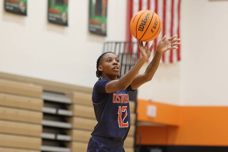 Oswego’s Destiny Hicks takes the outside shot against Plainfield East on Tuesday, Jan. 13, 2026 in Plainfield.