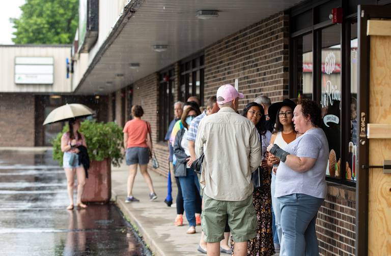 Attendees of the UpRising Bakery and Cafe's drag bunch wait to enter the bakery on Sunday, Aug. 7, 2022.