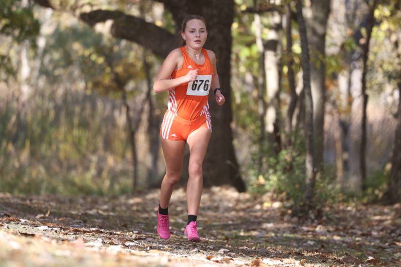 Oswego’s Audrey Sorderlind leads the group midway in the Girls Cross Country Class 3A Minooka Regional at Channahon Community Park on Saturday.