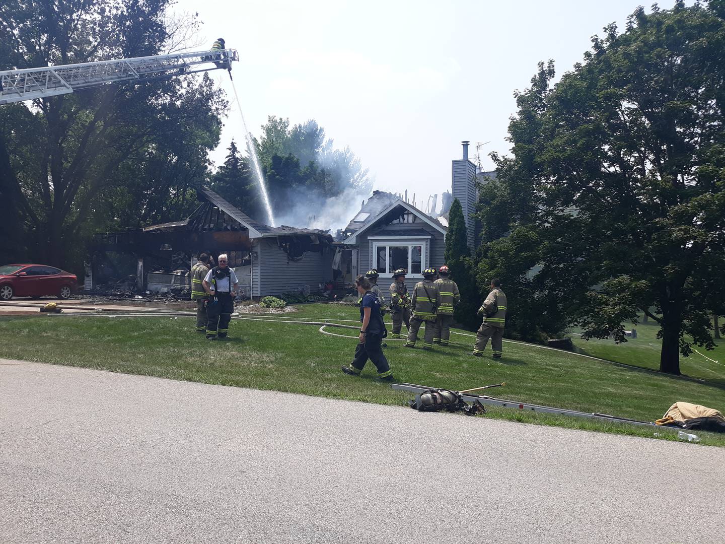 Firefighters respond the scene of a structure fire in Crystal Lake Saturday afternoon.