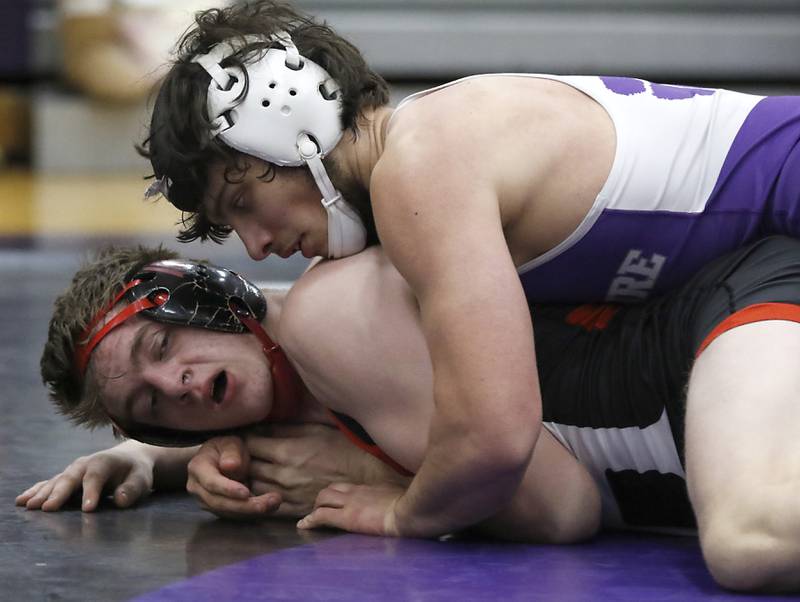 Hampshire's Aidan Rowells controls Huntley's Waylon Theobald during the 175-pound match of a Fox Valley Conference wrestling meet on Wednesday, Jan. 8, 2025, at Hampshire High School.