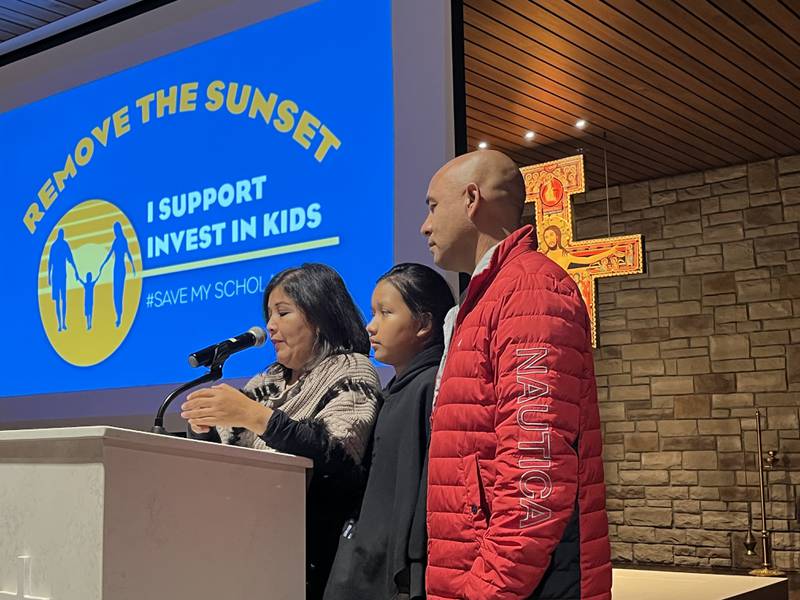 Araceli Romo Alvaredo (left), her daughter Melanie Rodriguez Romo, and her husband, Juan Rodriguez, on Friday, Oct. 13, 2023, at Joliet Catholic Academy. The family was among many who spoke in support of the Invest In Kids Scholarship Tax Credit Program.