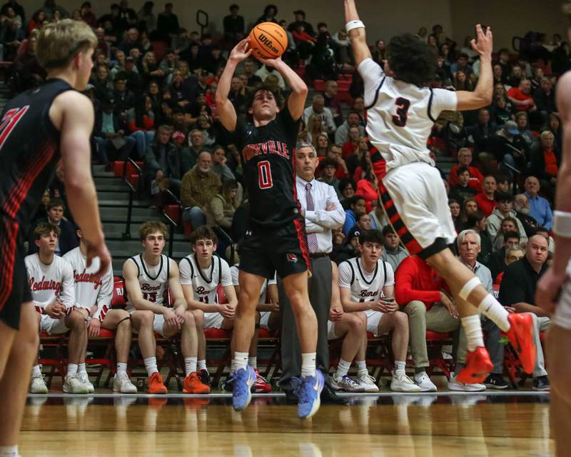 Yorkville's Gabe Sanders (0) shoots a jump shot during their Class 4A Bolingbrook Sectional semifinal basketball game between Yorkville at Benet, March 3, 2026 in Bolingbrook.