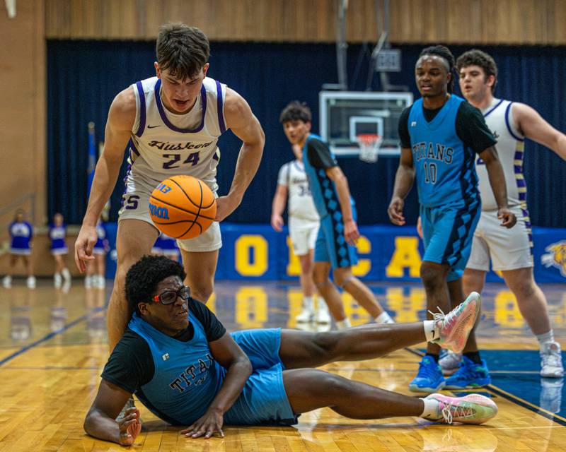 Lota Onwuameze (34) of IMSA lays on ground after failing to grab ball on dive as Payton Twait (24) of Serena looks down during the quarterfinals of the Little Ten Conference Tournament on Monday, Feb. 2, 2026 at Somonauk High School in Somonauk.