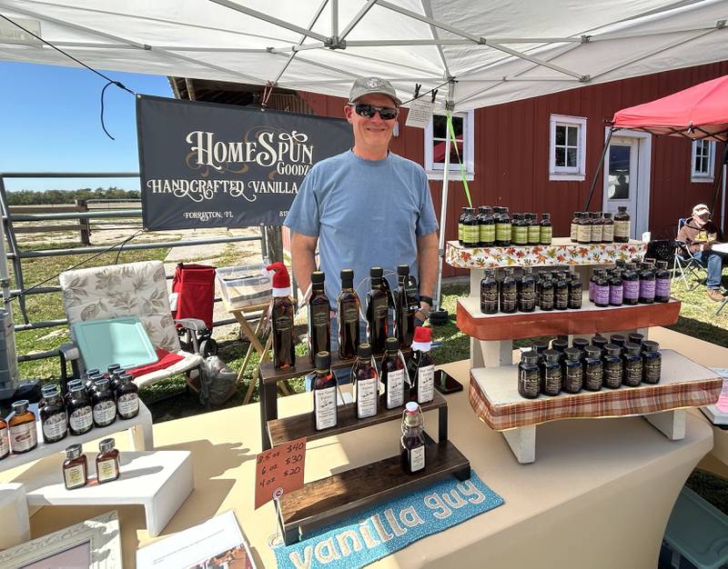 Tim LeClere of Forreston stands by his booth at Hough's Maple Lane Farm during the Back Roads Market event on Saturday, Sept. 28, 2024 north of Mt. Morris. LeClere is the owner of HomeSpun Goodz and sells pure vanilla extract. For more information, contact LeClere at tleclere@gmail.com or call 815-938-9011.