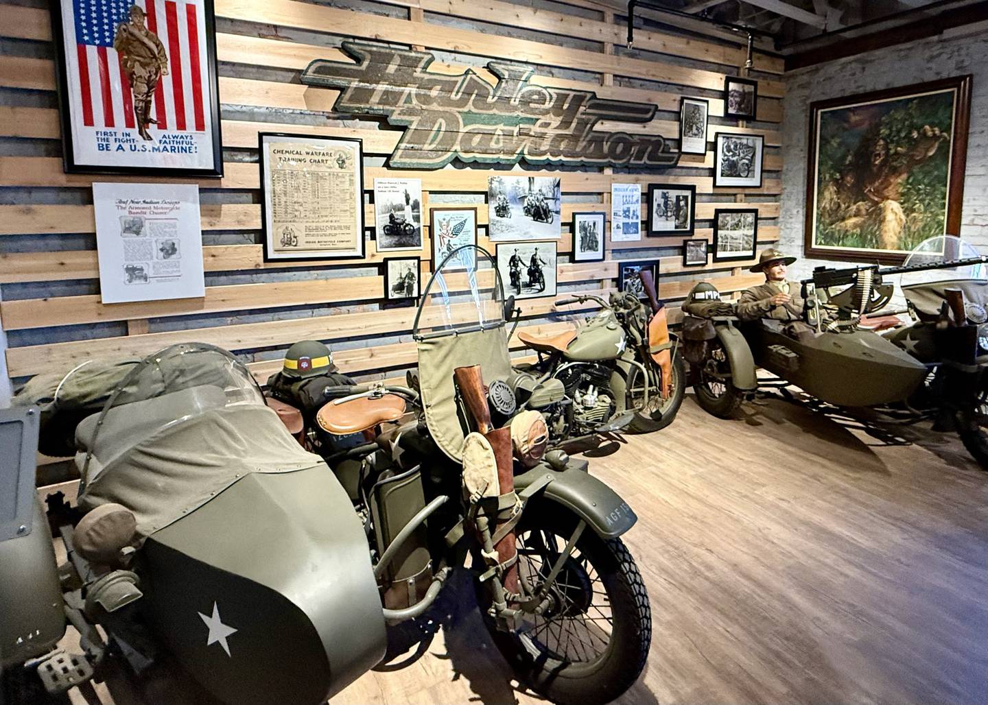 A display of Harley Davidson motorcycles used by the U.S. military in World War II in the St. Charles Motorcycle Museum and Art Gallery at 1317 E Main St. (Route 64) in St. Charles.
