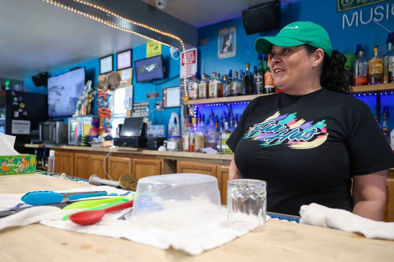 Manager Amanda Jolly smiles as she greets residents at the Fun Hub on March 12, 2026. The small bar transformed into a bustling hub of supplies, food and resources following the March 10 tornado that caused destruction in Aroma Township and across Kankakee County. Manager Amanda Jolly smiles as she greets residents at the Fun Hub on March 12, 2026. The small bar transformed into a bustling hub of supplies, food and resources following the March 10 tornado that caused destruction in Aroma Township and across Kankakee County.