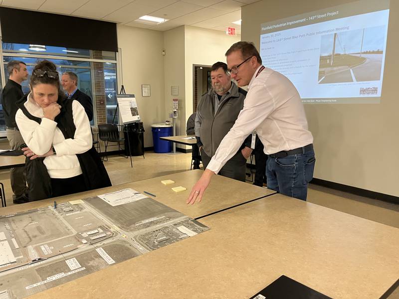 The village of  Plainfield planners explained plans for a multi-use path along the south side of 143rd Street between Wallin Drive and Van Dyke Road during an open house on Thursday,  Jan. 30, 2025.