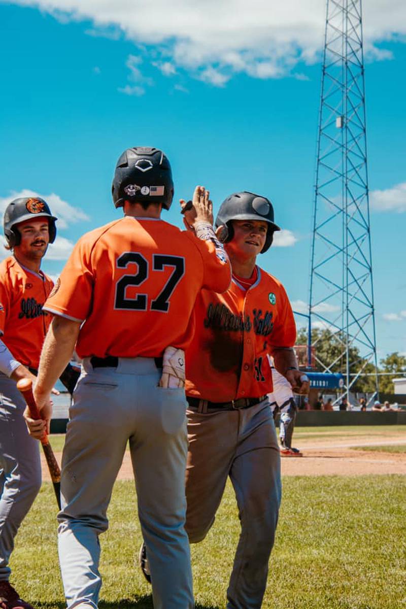 Illinois Valley Pistol Shrimp players Lucas Smith, Kyle Gibson and Chance Bentley celebrate during the teams' 20-hit attack Sunday, June 23, 2024, in Burlington, Iowa.