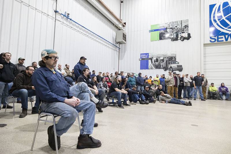 Employees of Sewer Equipment of Dixon gather Tuesday, Nov. 1, 2022 to watch the demonstration of the new rescue drone.