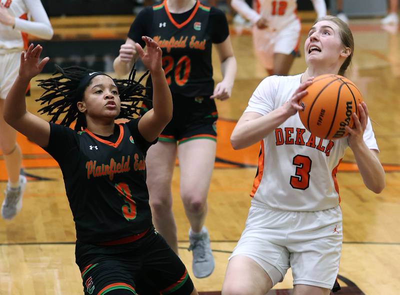 DeKalb's Olivia Schermerhorn gets a layup in front of Plainfield East's Gianna Thompson Thursday, Feb. 12, 2026, during their game at DeKalb High School.