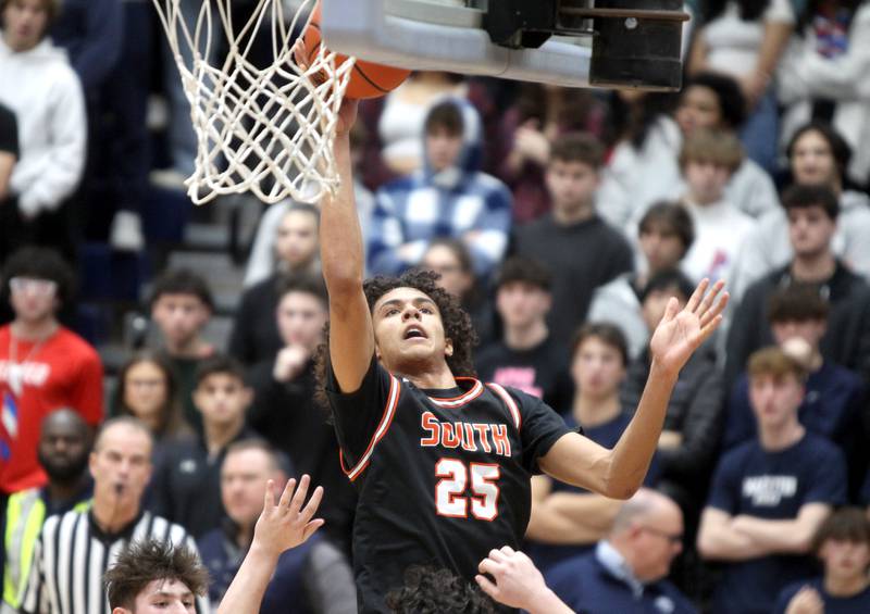 Wheaton Warrenville South’s Braylen Meredith gets a shot up during a game at Lake Park in Roselle on Friday, Feb. 10, 2023.