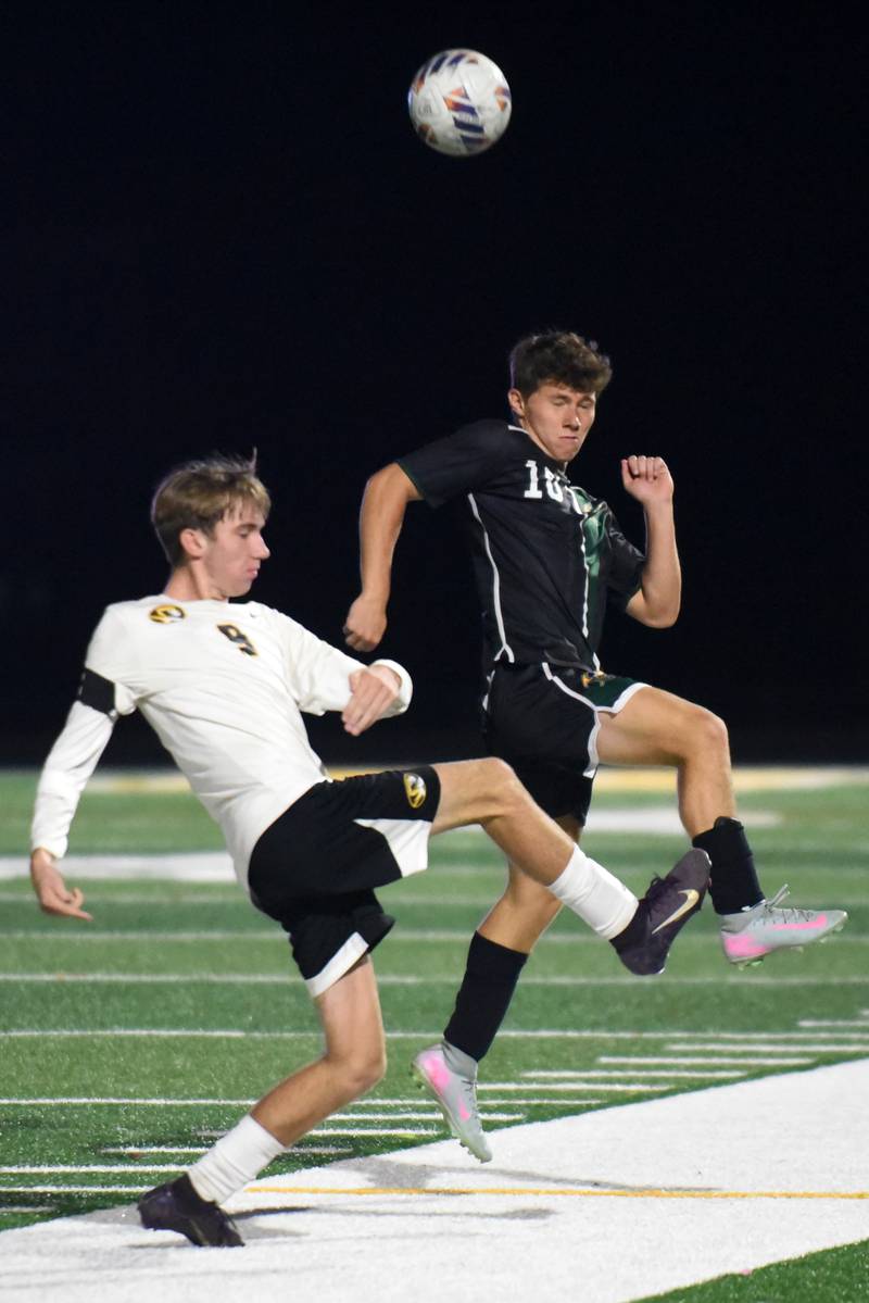 Coal City's Colton Lemmons, right, deflects a pass from Herscher's Rowan Keigher during a game at Coal City Thursday, Oct. 2, 2025.