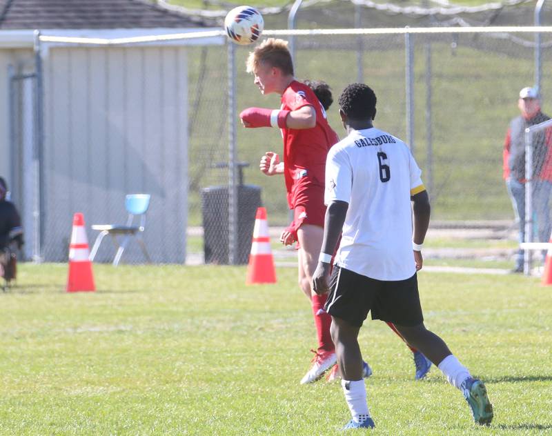 Streator's Joe Hoekstra jumps in the air for a header over Galesburg's Anthony Makwala during the Class 2A Regional final on Saturday, Oct. 26, 2024 at Ottawa High School.