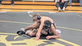 Football familiarity translates to wrestling win for Sycamore’s Adam Carrick; Spartans beat Rochelle