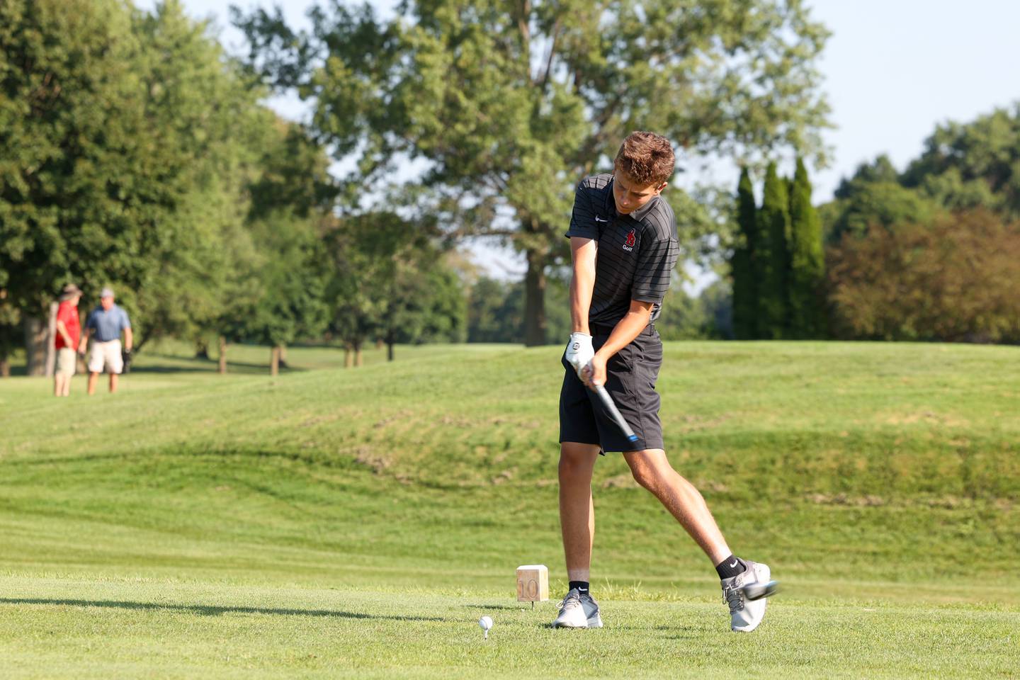 Bradley-Bourbonnais' Landan Haggard tees off during the Boilermakers' match against Sandburg at the Kankakee Elks on Aug. 14, 2025.