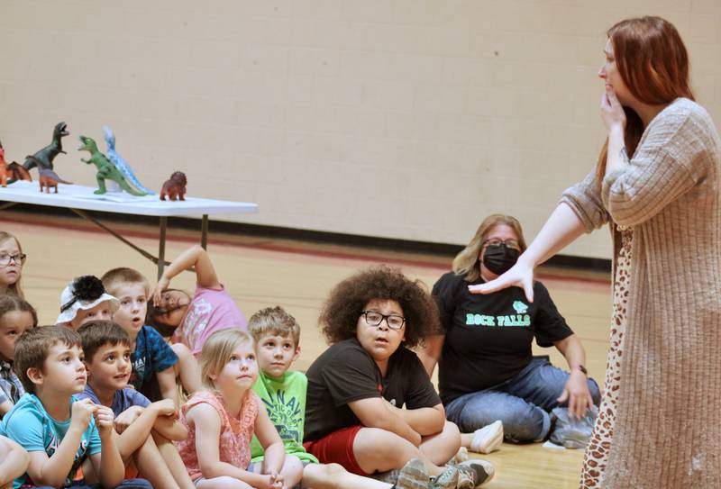 Amanda Fox, author of "Markertown," holds the interest of students during activities on Friday at East Coloma Nelson School in Rock Falls.