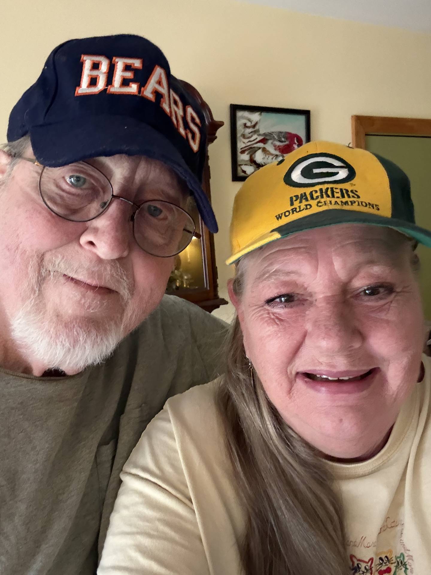 Steve and Jody Gee of McHenry, seen here on Friday, Jan. 9, 2026,  are a divided household, with Steve and a granddaughter supporting the Chicago Bears, and Jody and their daughter's family rooting for the Green Bay Packers.